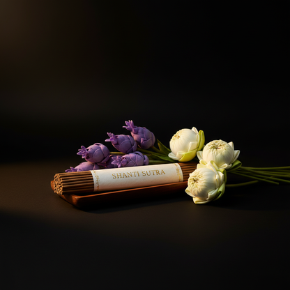 Shanti Sutra with fresh lavender sprigs and lotus flowers